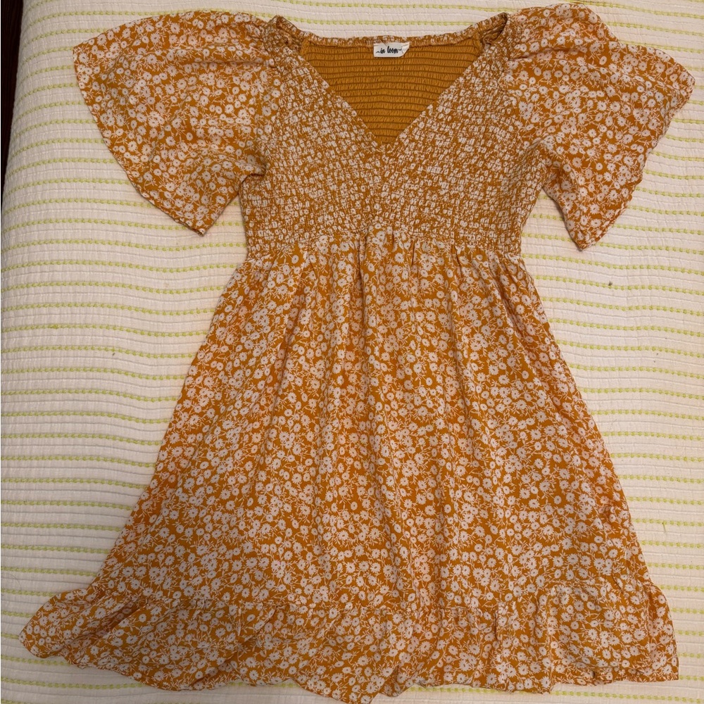 Maternity Yellow Floral Mini Dress. Smocked front and back